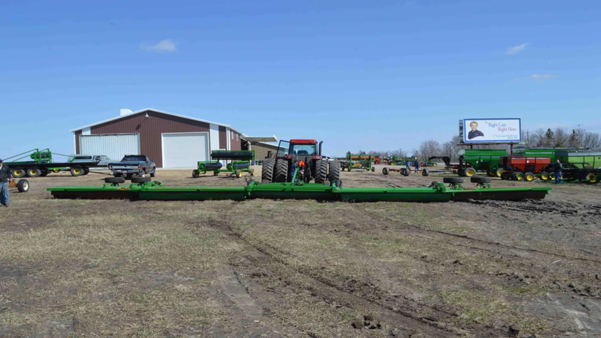 Agricultural equipment, farm machinery, Harms Manufacturing, farming tools, machinery display.