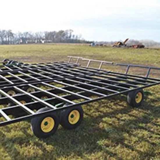 High-quality industrial trailer with durable frame and wheels for transportation of heavy machinery.