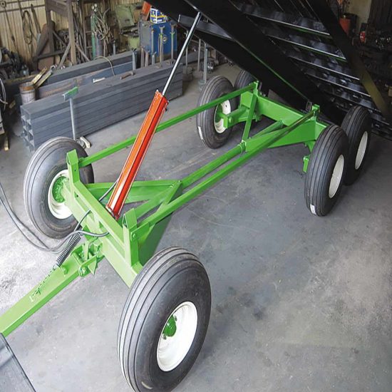 Durable green steel frame with hydraulic cylinder for agricultural machinery. Ready for farming tasks.